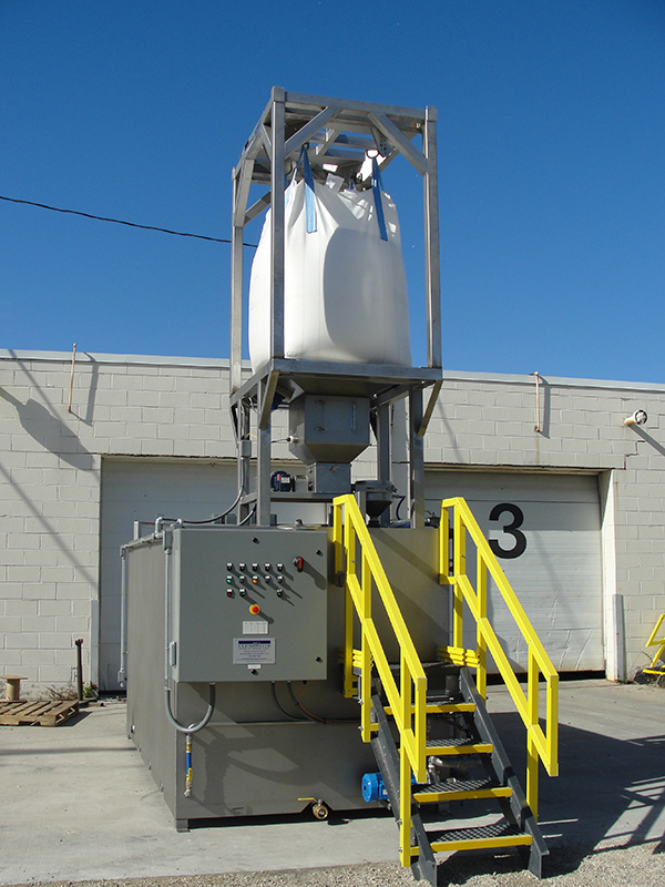 Clearwater Industries Model 3000 Stainless Steel Big Bag polymer make-down system shot from a distance to show the big bag mount, control panel and operator staircase..