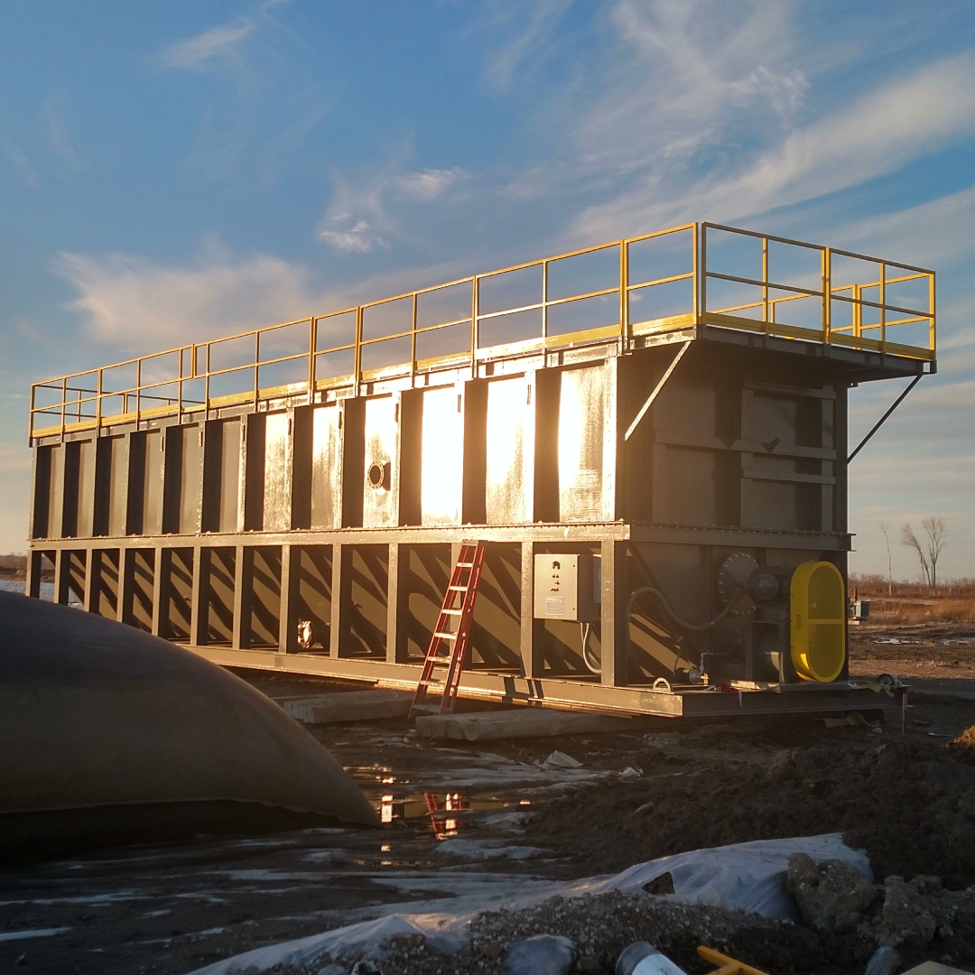 A large tank clarifier in the sun.