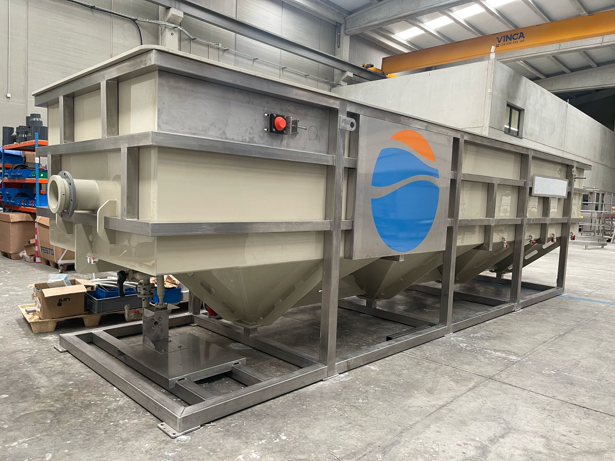 A DAF with a polypropylene tank and a 304SS frame on a factory floor.